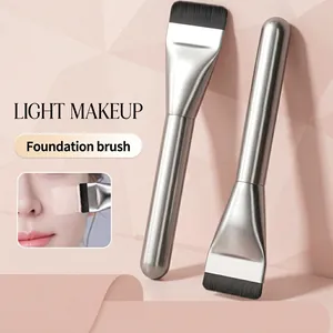 Flat foundation brush set with silver metal handles and black synthetic bristles