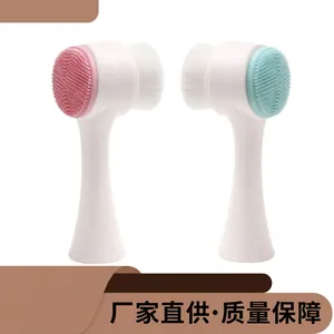 Close-up of double-sided facial cleansing brush with soft bristles and silicone massager