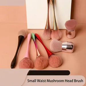Detail of soft pink synthetic bristles and colorful gradient handles on makeup brushes