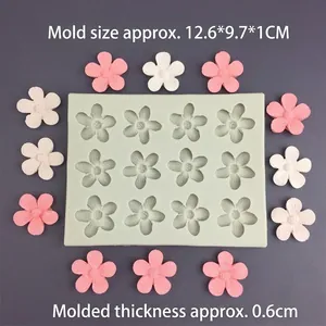 12-cavity silicone flower mold for chocolate, fondant and candles measuring 12.6x9.7x1cm