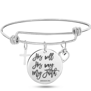 Detail of adjustable wire bracelet with cross heart and engraved religious pendant