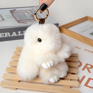 Pluffy cream bunny plush keychain with golden ring for bags and car accessory
