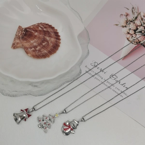 Christmas necklace set featuring stainless steel tree bell and snowman pendants for gift