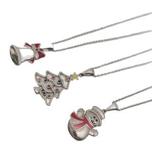 Stainless steel Christmas necklace set featuring enamel tree, bell, and snowman pendants