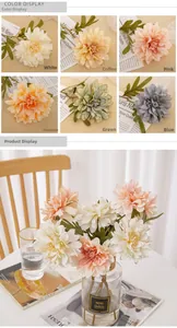 Detailed view of artificial dahlia petals and green leaves in six elegant color options