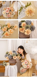 Detailed view of artificial dahlia flowers with realistic petals in multiple soft colors