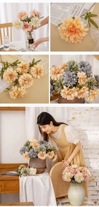 Detail of faux dahlia and daisies in warm orange and beige silk petals for home decor