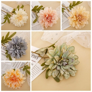Faux dahlia silk flowers in assorted vintage colors including white, pink and green