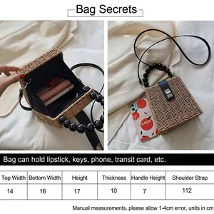 Handmade woven straw crossbody bag with black beaded handle and metal clasp for summer beach