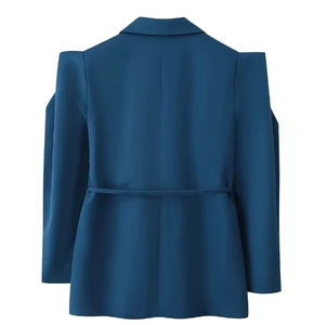 Rear view of peacock blue blazer featuring structured padded shoulders and slim waist belt