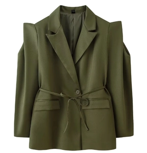 Detail of olive green blazer with structured cutout shoulders and waist tie belt