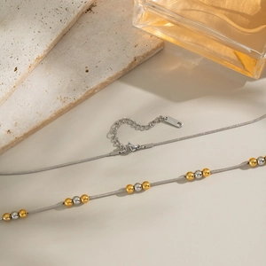 Collana a sfere bicolore in acciaio inossidabile con sfere oro e argento su catena snake