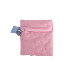 Pink quilted heart coin purse with zipper closure and blue ribbon loop for storage