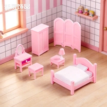 Detailed dollhouse furniture set in pink including bed, wardrobe and vanity mirror