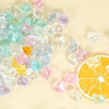 Mix of colorful acrylic ice rocks in pastel tones for DIY crafts and decoration