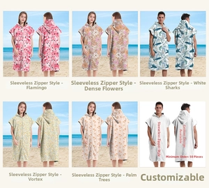 Detailed views of hooded beach ponchos with shark, flamingo and coconut tree prints