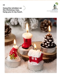 Detailed macro shot of four festive Christmas tealight candles on a rustic wooden base