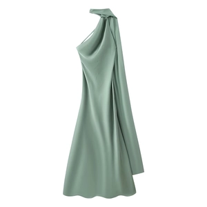 Detail of sage green satin halter neck dress showing elegant pleated shoulder texture