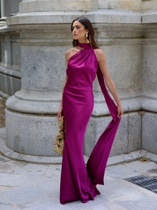 Elegant fuchsia satin halter maxi dress with long neck ties and high slit detail