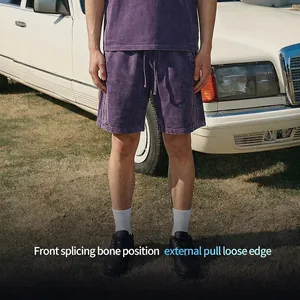 Vintage purple acid wash cotton shorts with raw edge stitching in a casual street style