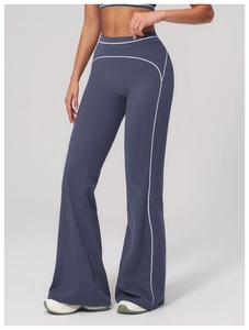 Detail of high waist flared yoga pants with contrast piping and tummy control design