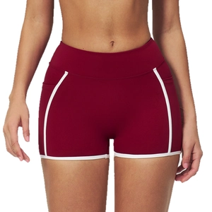 Burgundy high-waisted yoga shorts with white contrast piping and functional side pockets