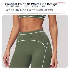 Close-up of olive green high waist yoga pants with white contrast stitching details