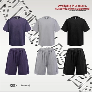 Detail of vintage washed cotton T-shirt and shorts set with raw edges and drawstring