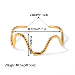 Detailed wave pattern gold cuff bracelet showing 6.37cm inner diameter and dimensions