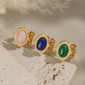 Vintage gold-plated stainless steel ring with oval turquoise stone in bohemian style