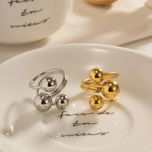 Minimalistischer Edelstahl-Wickelring mit drei Kugeln in Gold- und Silberoptik