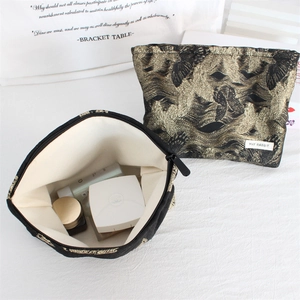 Retro relief jacquard makeup bag with gold wave pattern on black canvas material