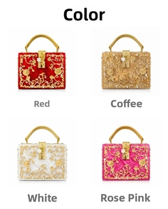 Detail of luxury acrylic evening clutch with hollow metal carvings and inlaid crystals