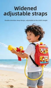 Close-up of child wearing adjustable backpack water gun on a sunny beach setting