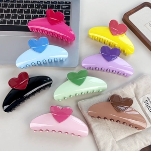 Set of 8 colorful heart-shaped large hair claw clips in glossy finish for long hair