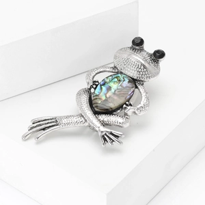 Vintage silver frog brooch with iridescent abalone shell and black crystal eyes for women