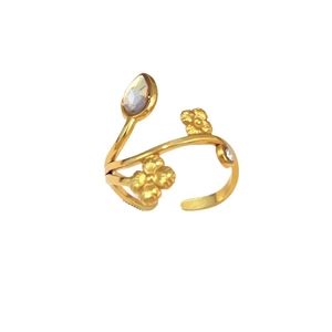 Golden adjustable ring with floral motifs and pear-shaped crystal on white background