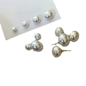 Vintage cherry blossom pink pearl stud earrings set with classic minimalist design