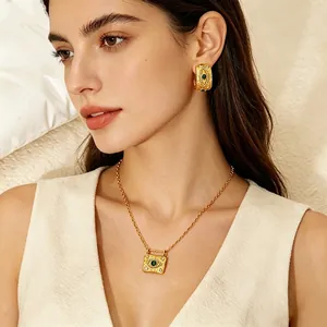 18K gold plated jewelry set with green malachite and zircon evil eye design on model