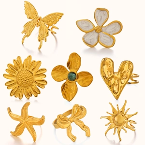 Set of 8 gold minimalist stainless steel rings with butterfly heart and starfish designs