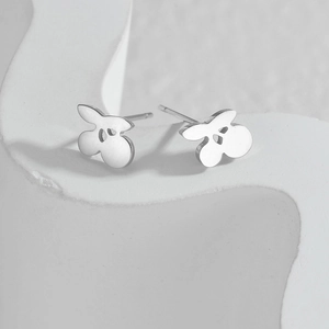 Minimalist silver stainless steel stud earrings featuring a hollow bear silhouette design