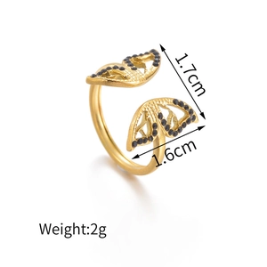 Macro view of gold butterfly ring with black rhinestones and dimension measurement