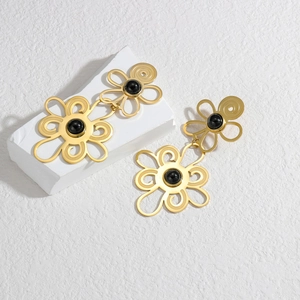 Vintage hollow flower drop earrings in gold with black beads and double floral layers
