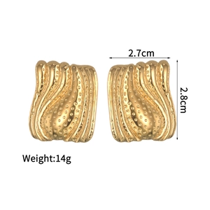 Detailed view of textured gold irregular square earrings showing 2.8cm size measurements