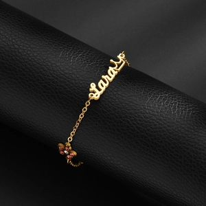 Custom 18K gold plated stainless steel name bracelet with flower and pink crystal charm
