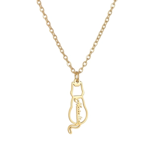 Detail of custom Natalia name necklace with cat shape pendant in polished gold finish