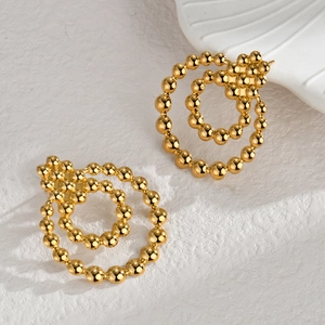 Boucles d'oreilles doubles anneaux géométriques en or 14 carats avec perles texturées