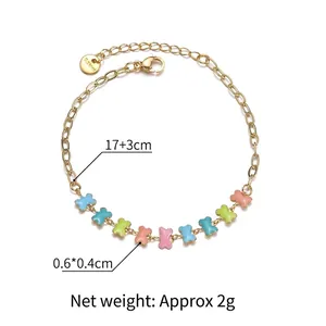 Bracelet chaîne en acier doré avec breloques os colorées en émail, longueur 17+3cm