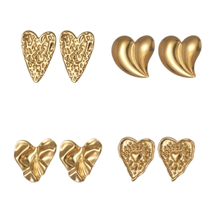 Four pairs of golden heart-shaped stainless steel stud earrings with diverse textures