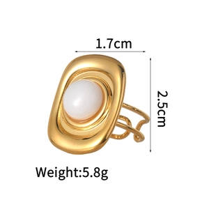 Detailed view of vintage gold ring with white stone insert including dimensions and weight